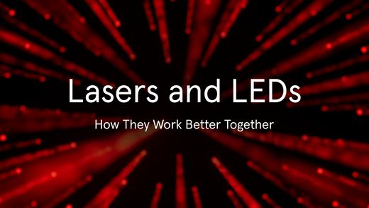 Lasers and LEDs. How they work better together. Image banner shows a black background with beaming lights of lasers.