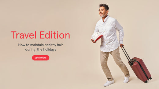 Travel edition. How To Maintain Healthy Hair During The Holidays. Image banner showing a mature man pulling his luggage while holding the Professional device in his other hand.