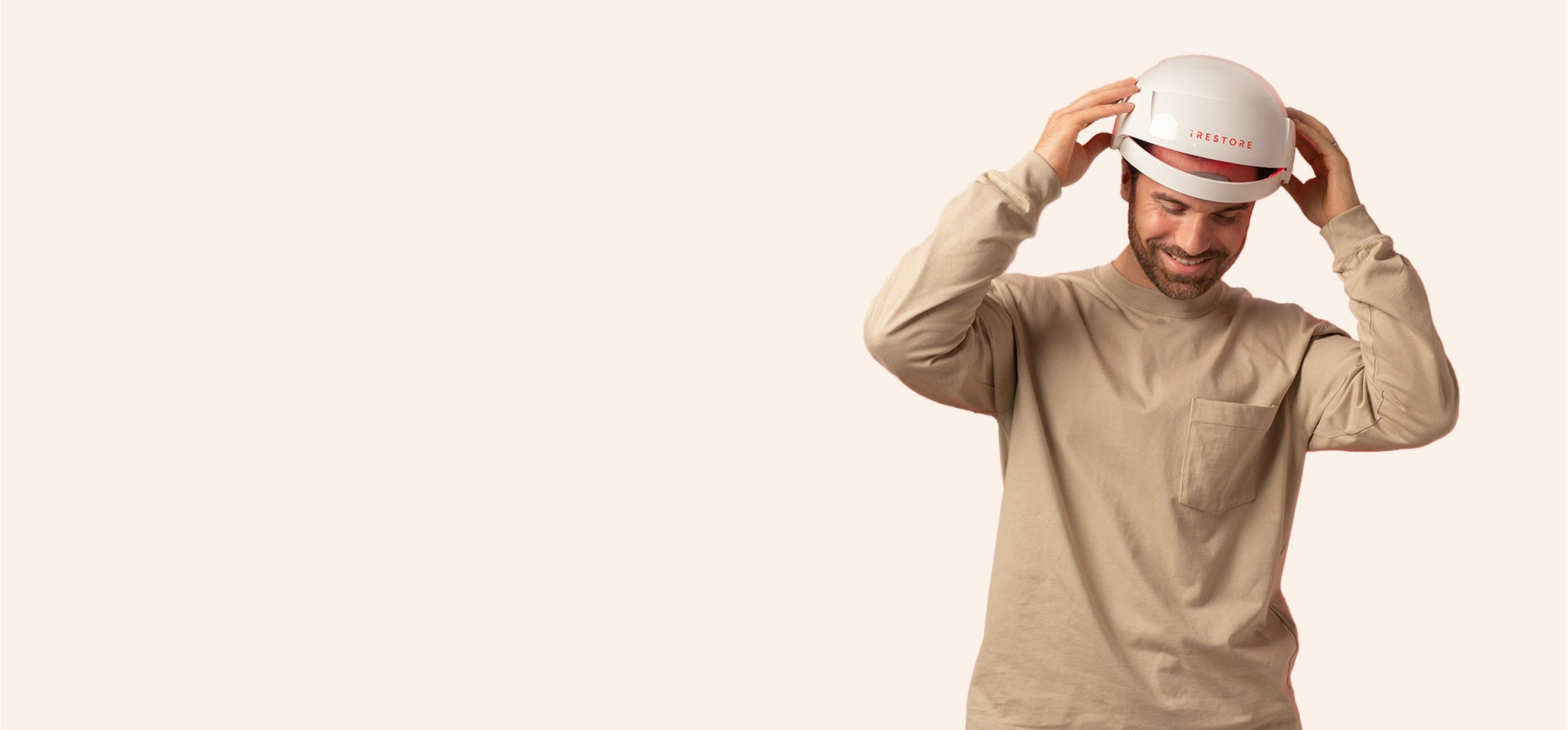 Image of a man wearing the Essential hair device.