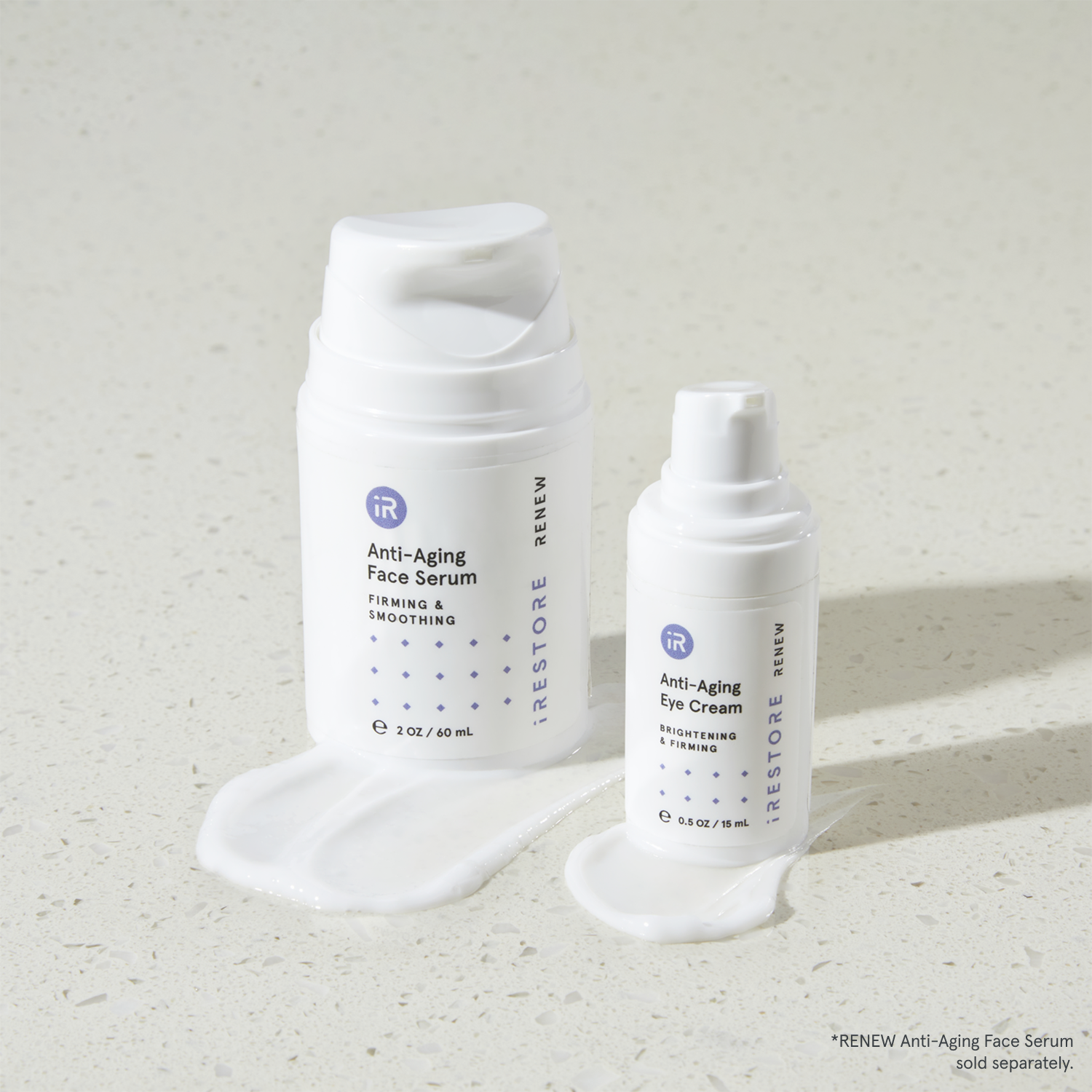 Anti-aging face serum and anti-aging eye cream beside each other