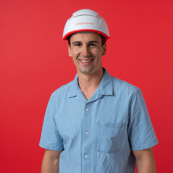 Image of a middle aged man wearing the Professional hair device.