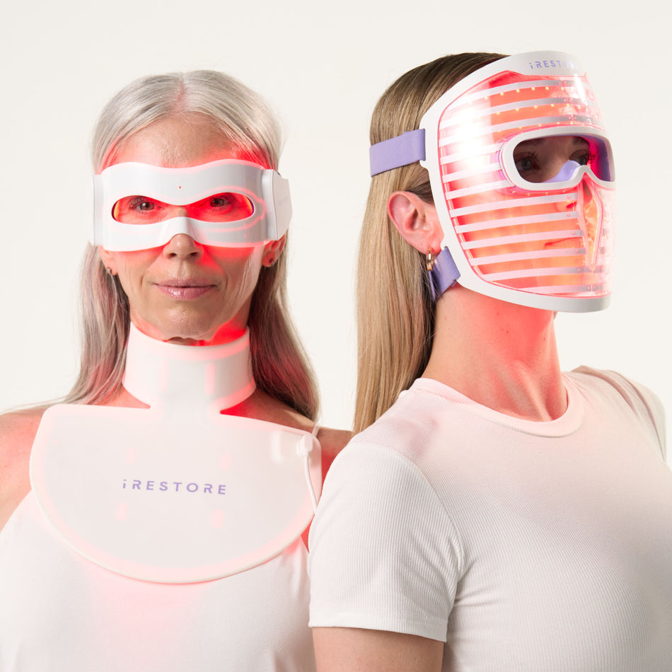 Woman wearing illumina eye mask and neck & chest mask next to woman wearing illumina face mask.