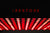 Red LED lights with 'iRESTORE' text on a black background