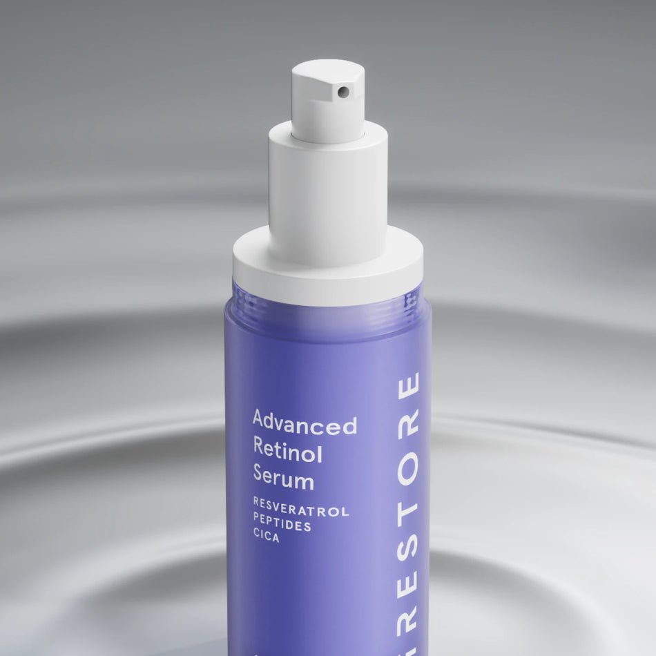 iRESTORE Adv Retinol Serum on gray background