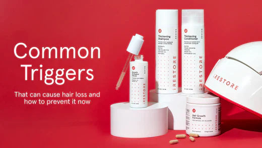 Common triggers that can cause hair loss and how to prevent it now.  Growth Activator Serum, Thickening Shampoo, Thickening Conditioner, Hair Growth Formula, and iRESTORE Pro device beside each other.