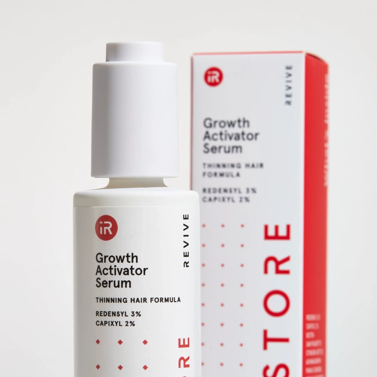 Image showing the Growth Activator Serum with its packaging box beside it.