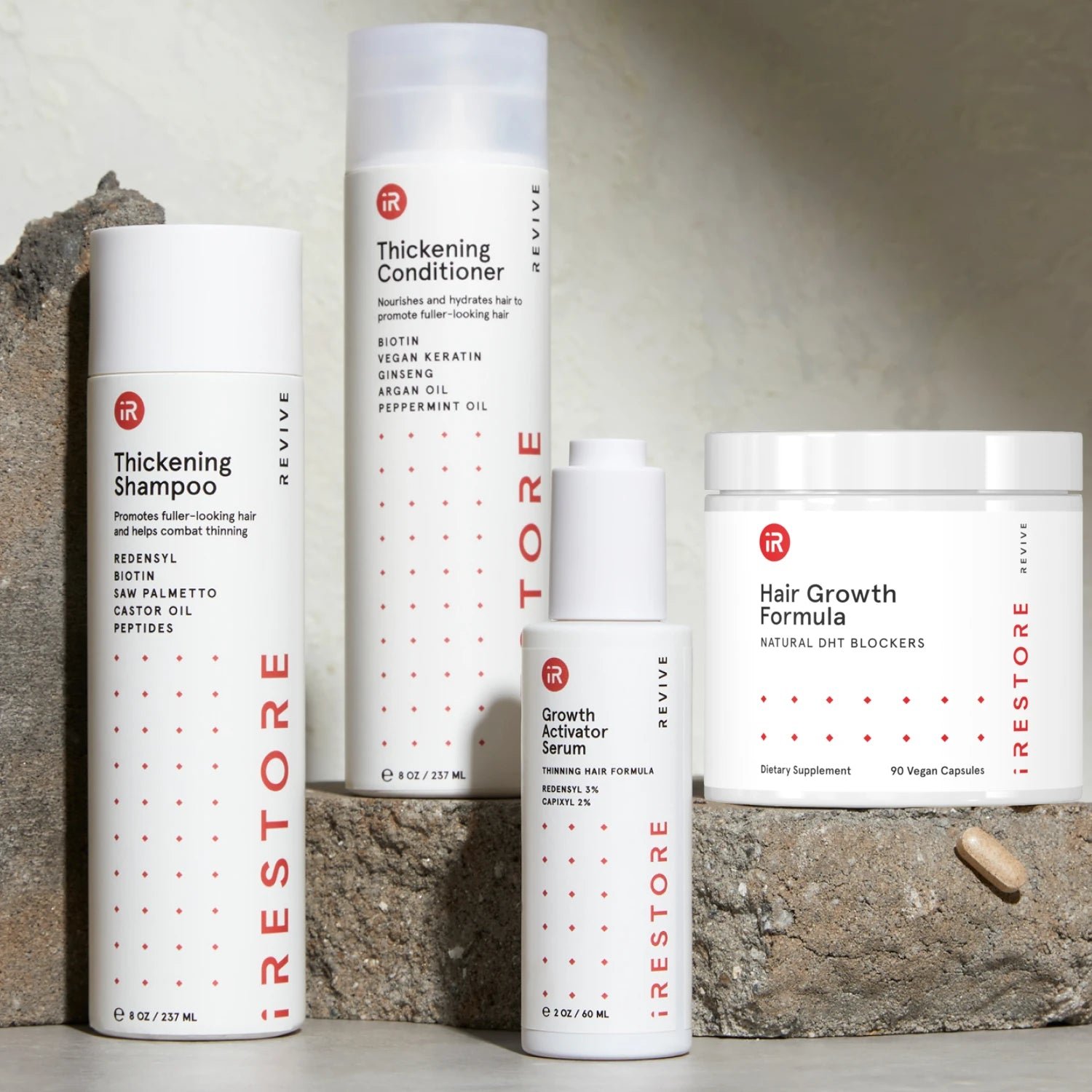 Image showing the REVIVE Max Growth Kit. Includes the Thickening Shampoo, Thickening Conditioner, Growth Activator Serum and the Hair Growth Formula.