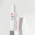 Image showing the Growth Activator Serum placed on top of a rock.