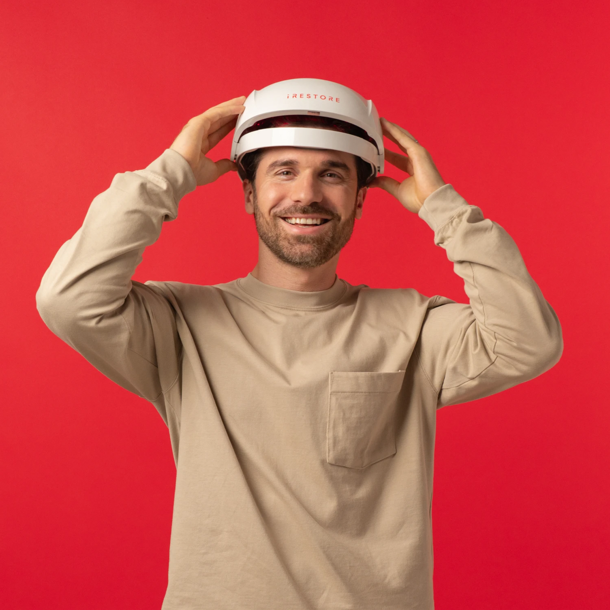 Image of a middle aged man wearing the Essential hair device.