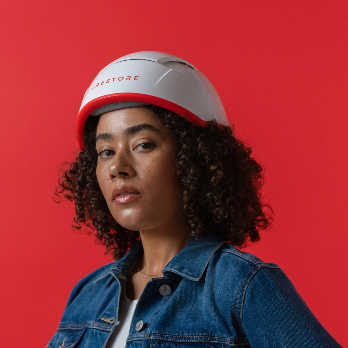 Image of a middle aged woman wearing the Professional hair device.