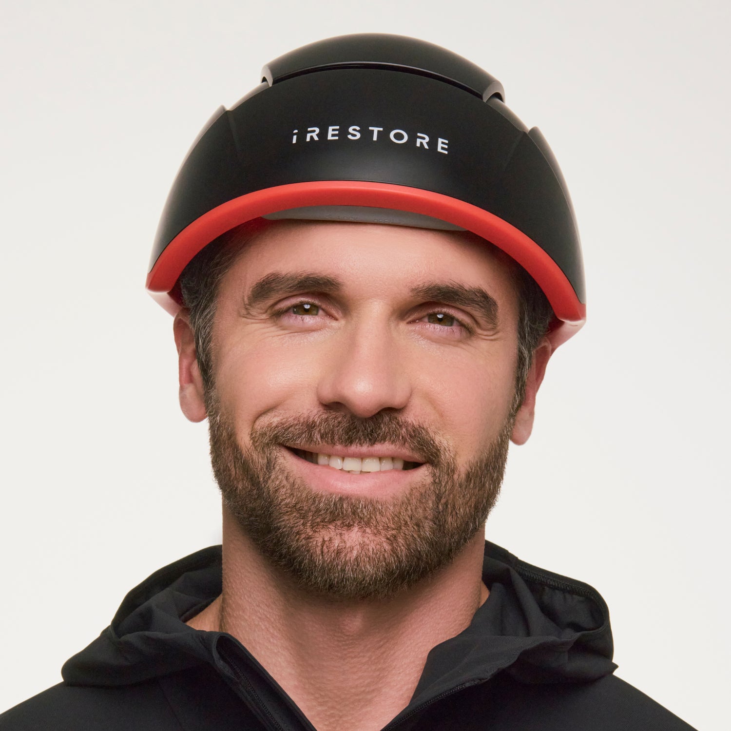 man wearing the Elite hair device.