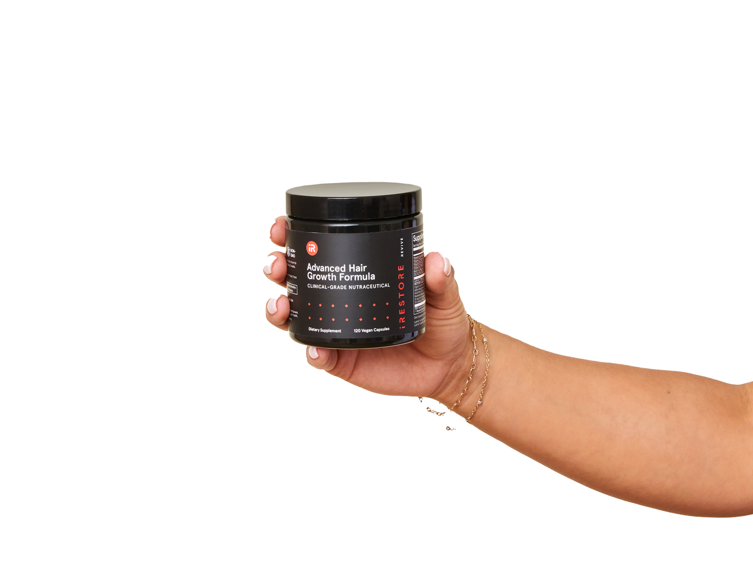 Image of a hand holding the jar of the Advanced Hair Growth Formula.