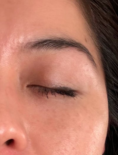 Close up shot of woman's eye area after using LED eye mask where improvements can be seen