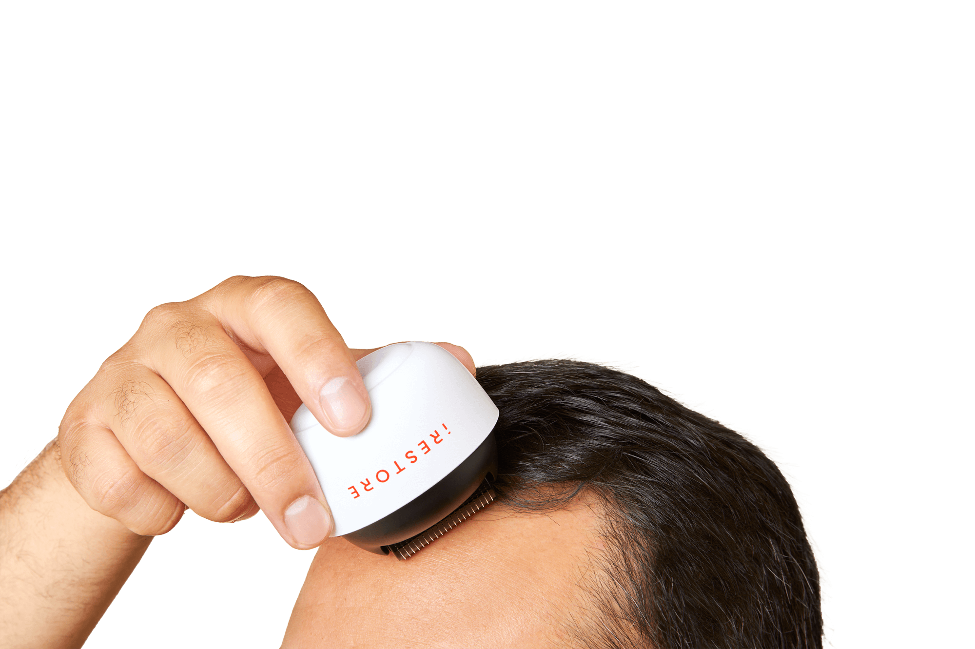 Close up shot image of a man rolling the derma roller in his scalp.