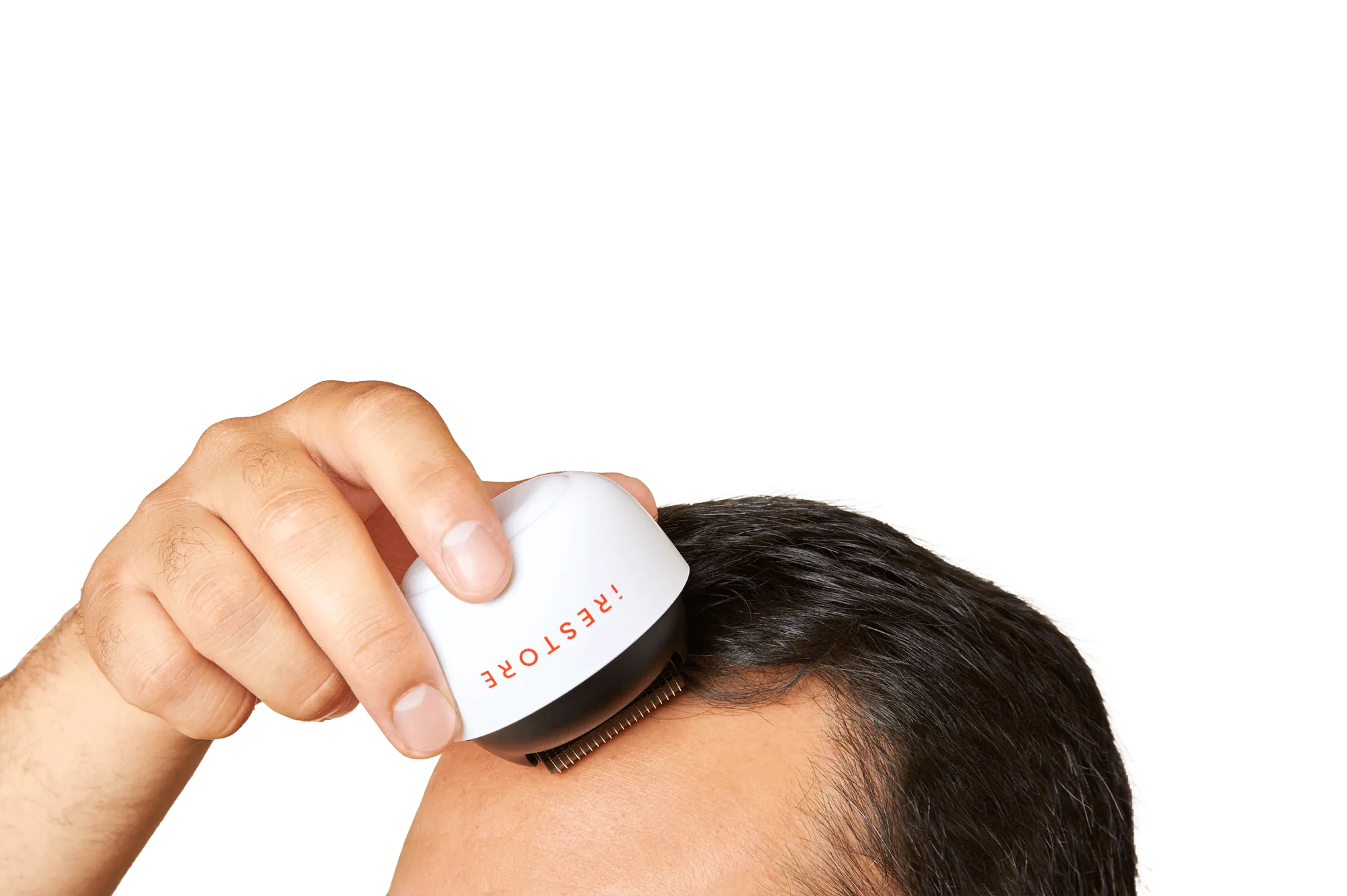 Close up shot image of a man rolling the derma roller in his scalp.