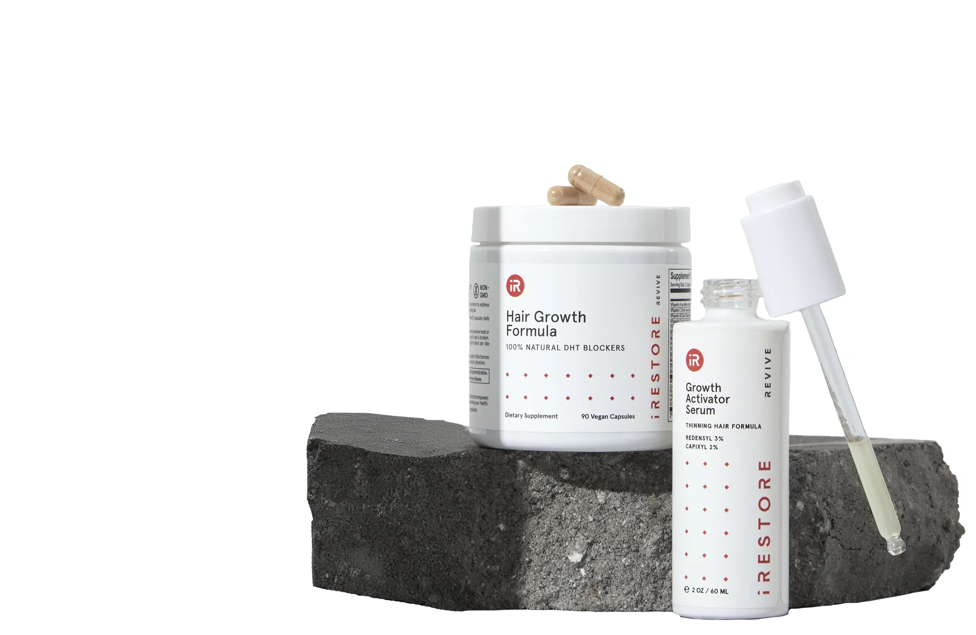 Image showing the REVIVE Growth Accelerator Kit place on top of a rock.
