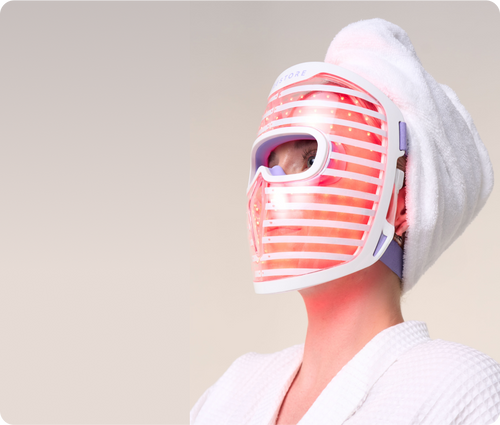 Woman wearing LED face mask