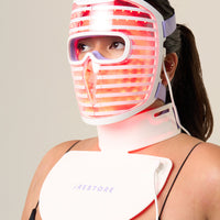 Image of a woman wearing the Illumina Face Mask and the Neck & Chest Mask.