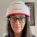 Woman wearing iRESTORE professional device