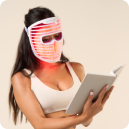 woman wearing LED face mask