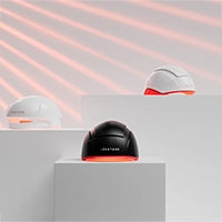 irestore helmets on stand against light background with red light