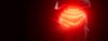 3D Image of the Elite helmet device placed on top of a 3D model head showing the lasers beams.