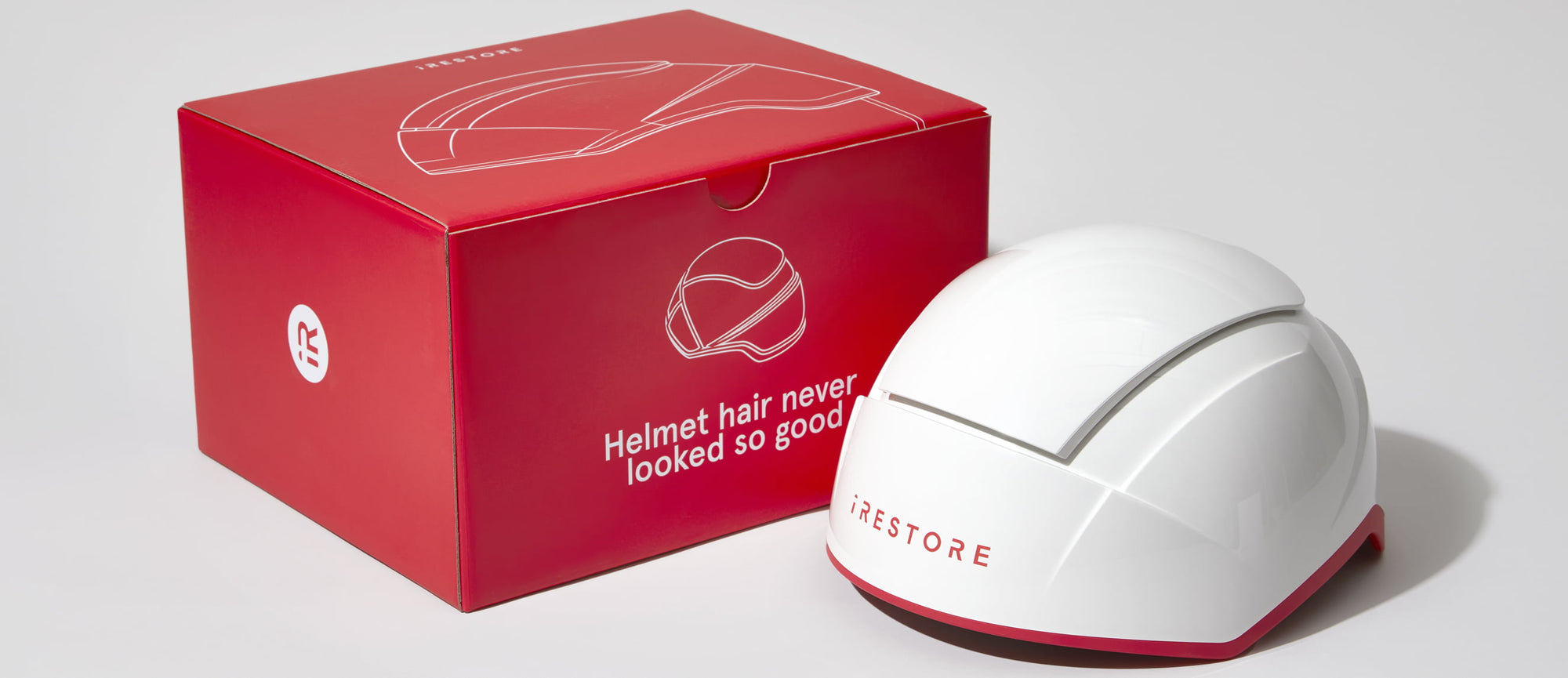 Image of Professional Device next to packaging box.