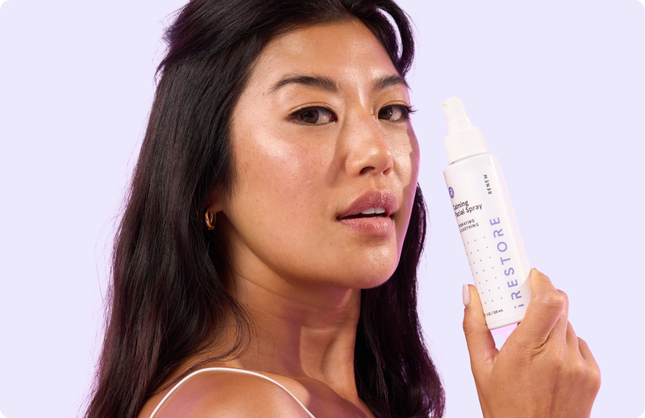 Woman holding the Calming facial spray