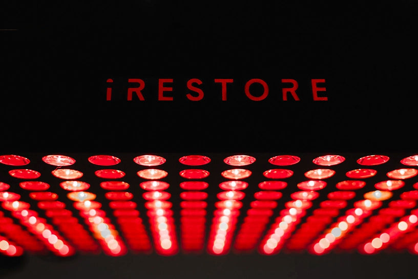 Red LED lights with 'iRESTORE' text on a black background