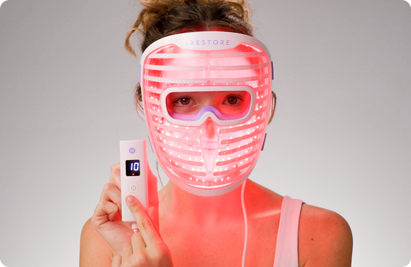Woman wearing illumina LED face mask