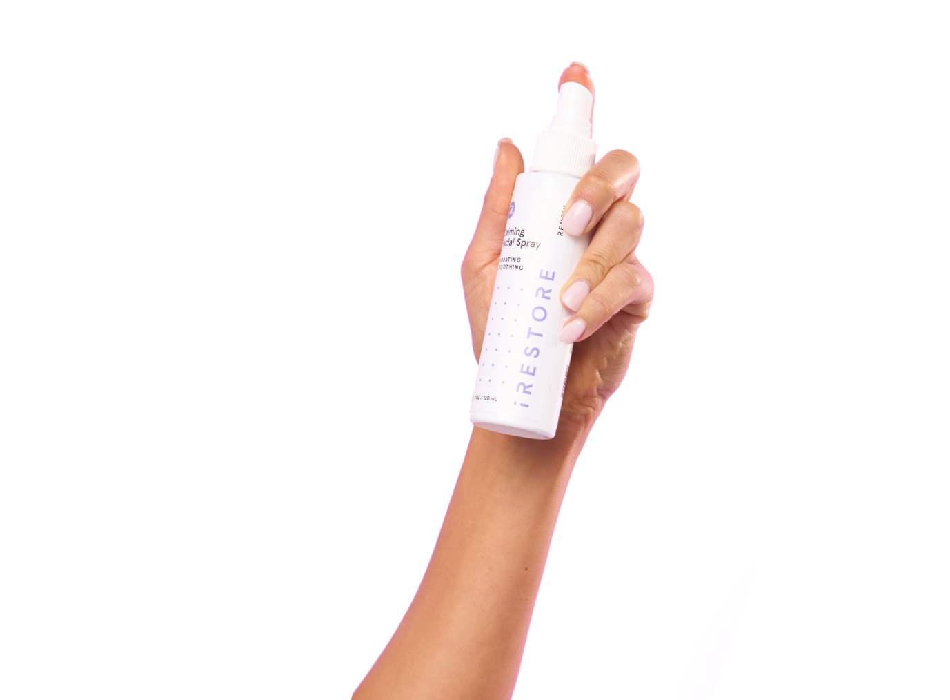 Hand holding the Calming facial spray