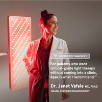 board-certified dermatologist, Dr. Janet Vafaie, MD, FAAD, stands next to a glowing iRESTORE light therapy panel. A "DOCTOR RECOMMENDED" badge overlays the image with her quote: “For patients who want clinical-grade light therapy without coming into a clinic, Apex is what I recommend.”