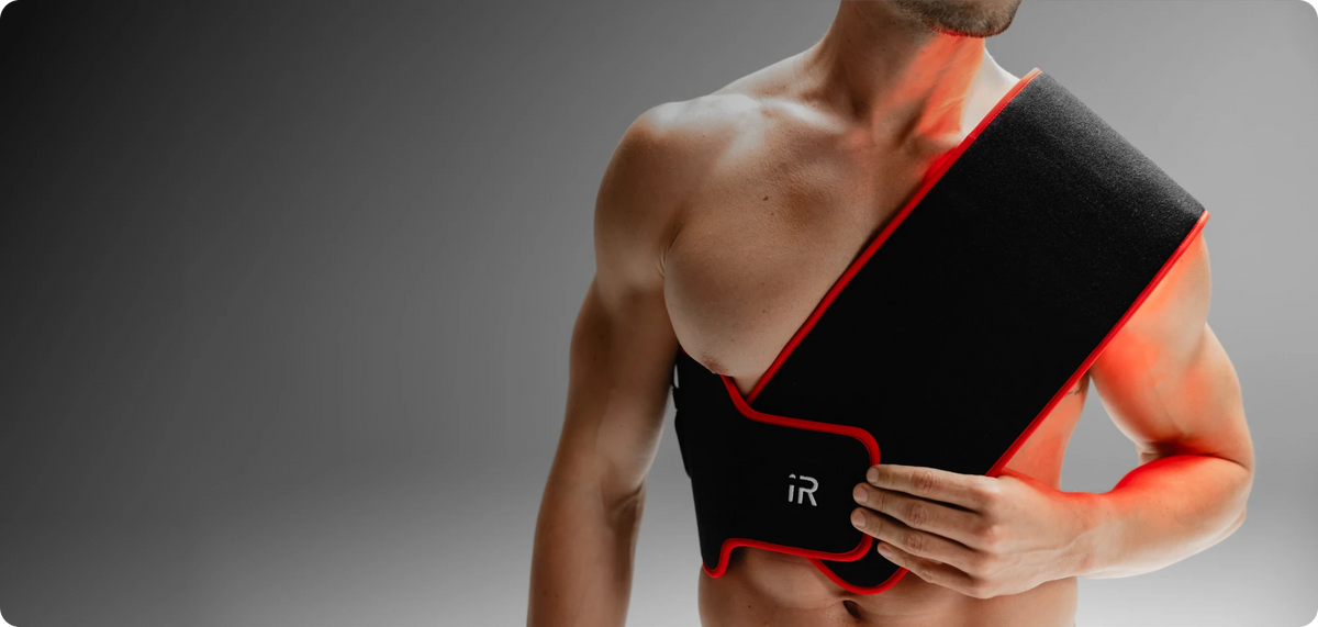 A close-up of a person's torso wearing the flex belt across their chest and shoulder.