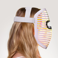 side view of woman wearing laser face mask pro 