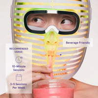 woman drinking through a straw while wearing the face mask pro, labeled "Beverage Friendly" with usage recommendations of 10-minute sessions, 3 to 5 times per week.