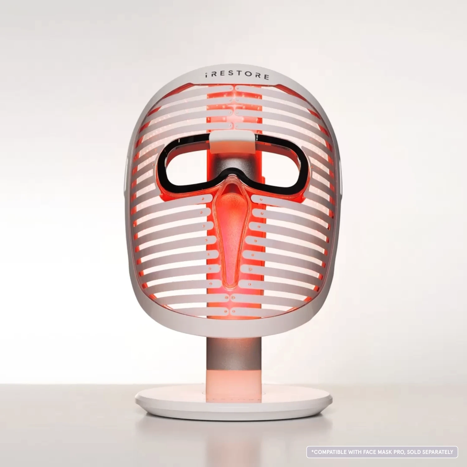 front shot of face mask pro on the glow stand