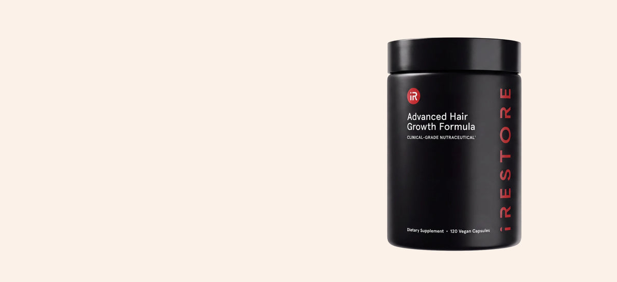 Advanced Hair Growth Formula against linen background