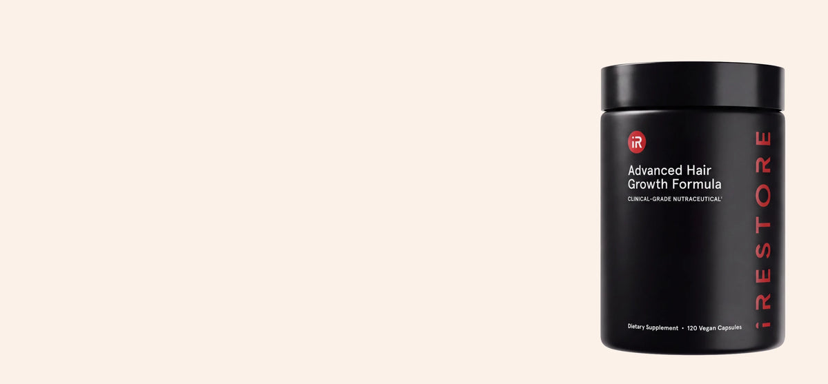 Advanced Hair Growth Formula against linen background