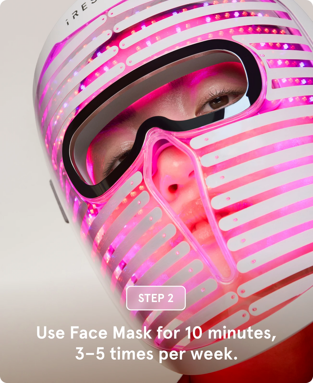 person wearing a glowing face mas pro, accompanied by text labeled "STEP 2 (Optional): Use your iRESTORE face mask as directed."
