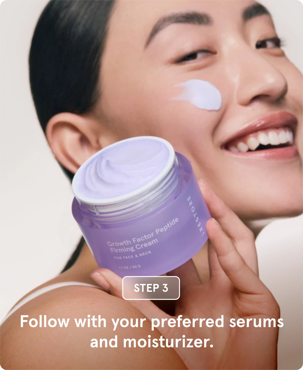 woman holding a jar of iRESTORE Growth Factor Peptide Firming Cream with a smudge of cream on her cheek, accompanied by text for Step 3: Apply over face and neck.