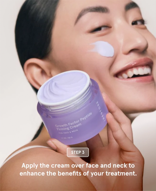 woman holding a jar of iRESTORE Growth Factor Peptide Firming Cream with a smudge of cream on her cheek, accompanied by text for Step 3: Apply over face and neck.