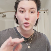 Woman showcasing the before and after results of using the eyebrow enhancing serum 