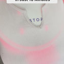 Woman showcasing how the iRESTORE led neck and chest mask can transform your skin in just ten minutes