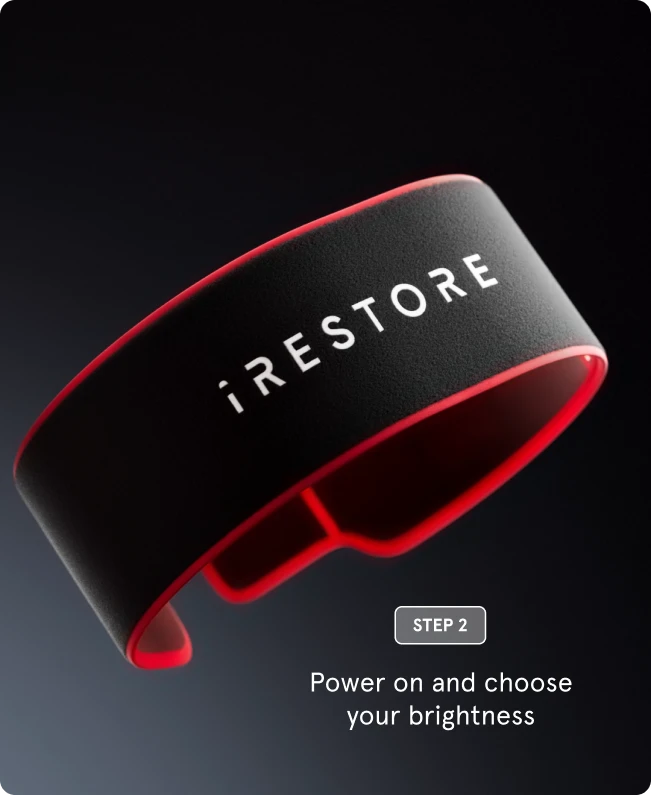 "Step 2" showing the exterior of a black iRESTORE sculpt belt with a red border. The text overlay reads: "Power on and choose your brightness."