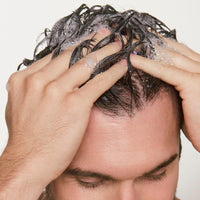 man's hair with bubbles