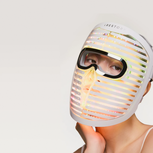 woman wearing the laser face mask pro and illumina neck and chest mask