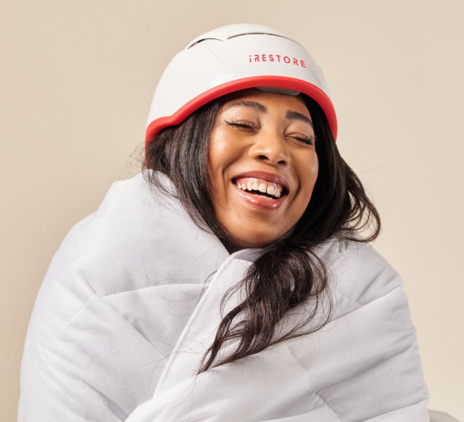 Image of a woman wearing the Professional device helmet.