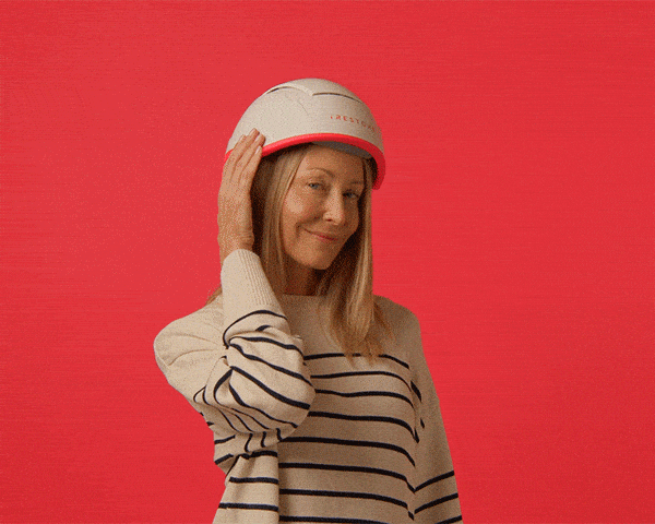 GIF of a matured woman wearing and modelling the Professional helmet device.