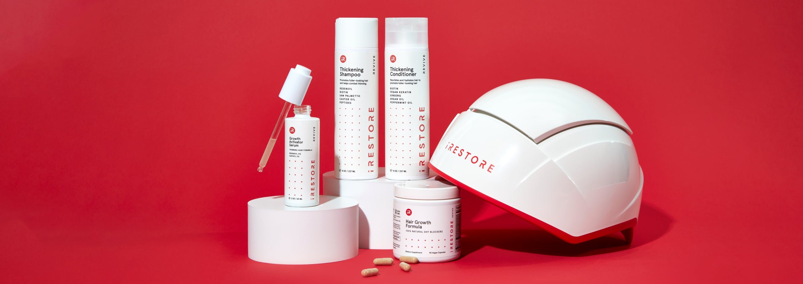 Image shows the REVIVE Max Growth Kit. Includes the Thickening Shampoo and Conditioner, Growth Activator Serum and Hair Growth Formula together with the Professional Device.