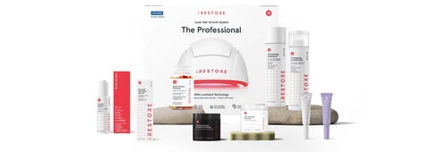 Image banner showing the products from iRESTORE. Including Professional Device, Thickening Shampoo and Conditioner, Eyebrow and Eyelash Serum, Growth Activator Serum, Hair Growth Formula and Advanced Hair Growth Formula.